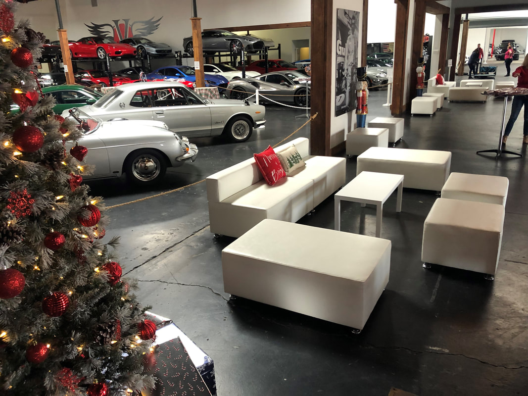 Holiday party with white lounge furniture.